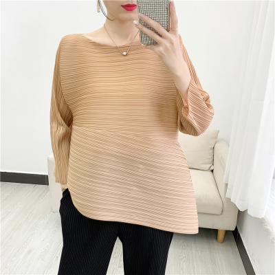 China Anti-wrinkle Tianbao Spring Korean Elegant Casual Long Sleeve Pleated Skirt Quilting Asymmetrical Casual Top for sale