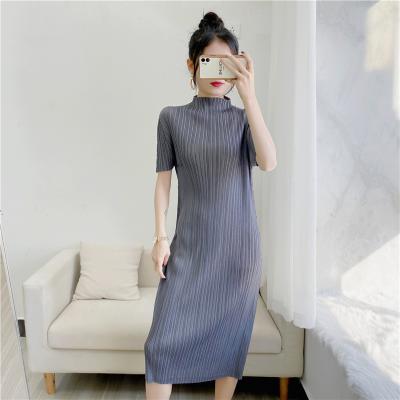 China Anti-wrinkle Tianbao Pleated Skirts Popular Casual Fashion High Quality Pleated Short Sleeves Casual Dress for sale