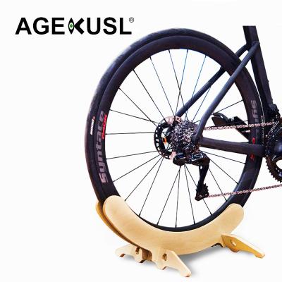 China AGEKUSL MTB Wooden Bike Display PMMA Park Rack Road Mountain Bike Folding Bicycle Parking Standing Rack for sale