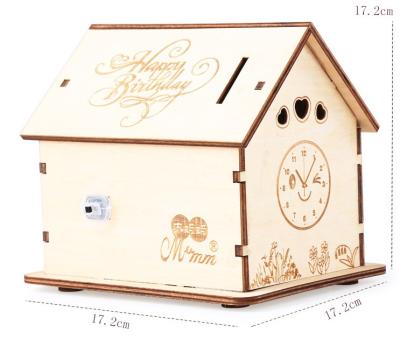 China China Laser Engraving Christmas Piggy Bank Wooden House Design Saving Box Wooden Money for sale