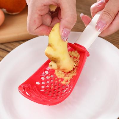 China Viable Kitchen Multifunctional Spoon Silicone Kitchen Bakeware Hammer Garlic Press Garlic Crusher Spoon Beat Egg Small Piece for sale