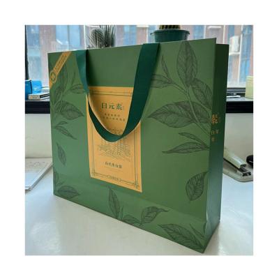 China Luxury Custom Recyclable Gift Garment Art Paper Shopping Bags With Logo Prin for sale