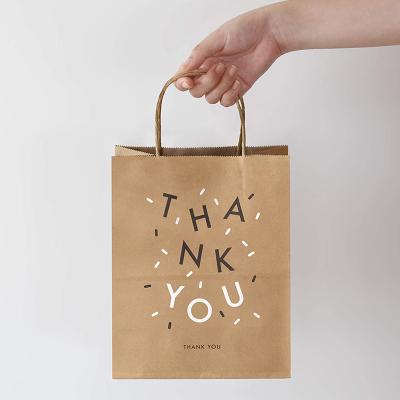 China Custom Recycled Materials Logo 100% Recycled Brown Kraft Paper Grocery Bag Kraft Paper Shopping Bag With Handle for sale