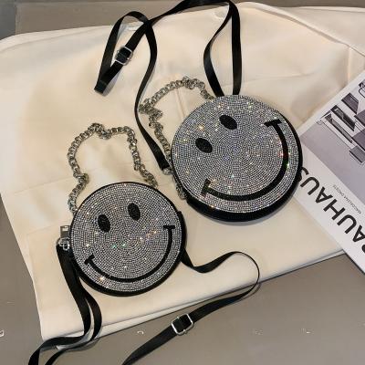 China Fashion rhinestone shoulder ladies pinch smile small round face shape flapper girl's fashion bags diamond handbag for sale