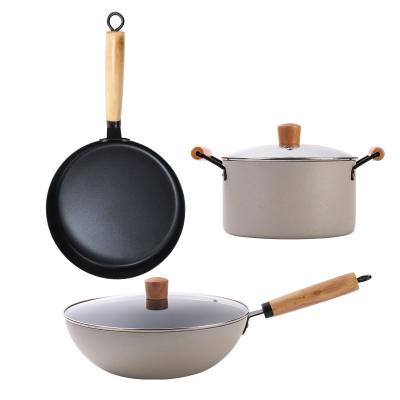 China 2023 Sustainable Kitchen Cookware 3 Pieces Soup Pot Wok Set Cookware Household With Wood Handle Glass Lid for sale