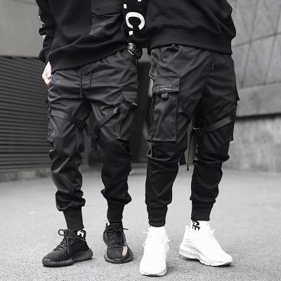 China Anti-wrinkle Autumn Joggers Pants Overalls Black 2022 Fashion Loose Pockets Pants Men Ribbons Multi-pocket Hip Hop Cargo Pants for sale