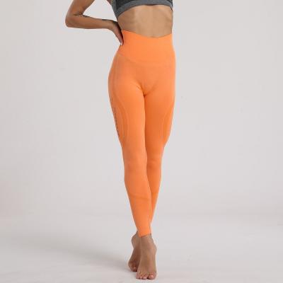 China New Hot Spot High Waist Air Hole Exercise Seamless Hip Yoga Tight Pants Women Breathable Elastic Gaiters for sale