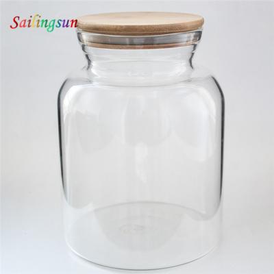 China Sustainable Design Oversized Classic Bamboo Lid Handmade Pyrex Glass Jar for sale