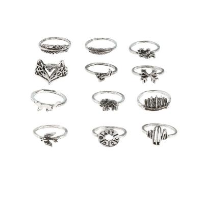 China FASHIONABLE Swallow Leaf Elephant Fox Palm Fairy Dish Combination Ring Opp Bag Alloy Gemstone 12 Piece Set Rings Silver Plated Zircon J0013 for sale