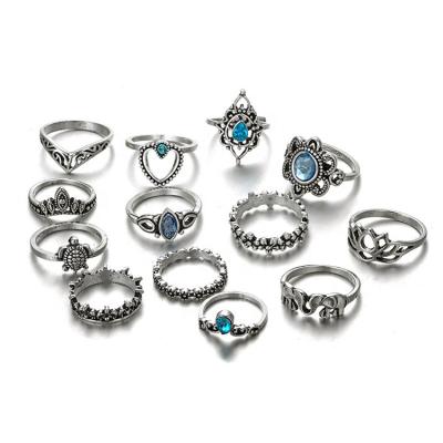 China Fashion and Blue Crystal Diamond Carving Crown Ring Combined Set of 13 Pieces Retro Opp Bag Alloy Gemstone Rings Silver Moissanite for sale