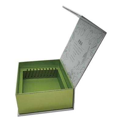 China Biodegradable Custom Luxury Book Shaped Rigid Paper Packaging Magnetic Gift Boxes With EVA Foam Insert for sale