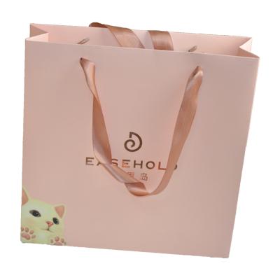 China Biodegradable Jewelry Paper Bags Kraft Paper Packaging Bag With Handle For Shopping for sale