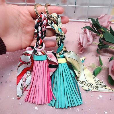 China Promotion Gift Leather Tassel Satin Scarves Key Chain Holder Bowknot Scarf Key Chain Holder Woman Handbag Car Purse Silk Key Chains Pendant for sale