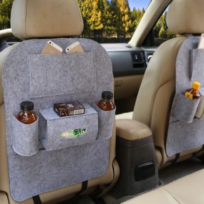 China Convenient Organizer Car Storage Pockets Car Back Seat Organizer Hanging Bag Felt Multi-pocket Storage Pocket for sale