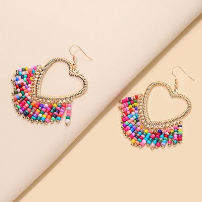 China TRENDY Iridescent Glass Beads Shape Stranded Hearts Spring Beige Beads Earrings for sale