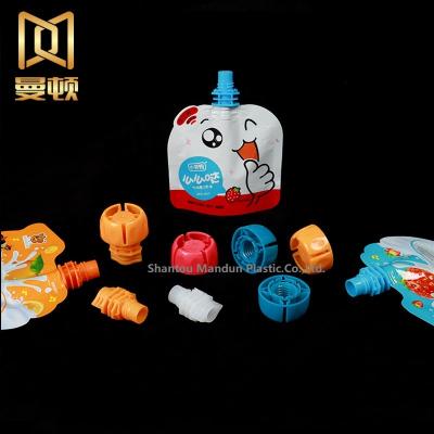 China Non Spill Free Plastic Beverage Pouch Child Cap 10mm Wedge Free Spout Cap For Juice Bag for sale