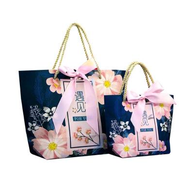 China Recyclable Custom Biodegradable CMYK Printing Drawstring Handle Shopping Gift Bag for sale