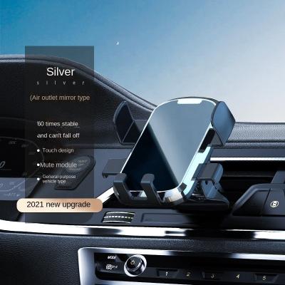 China 2022 universal car phone holder suction cup factory direct sales car air mouth adjustable dashboard navigation for sale