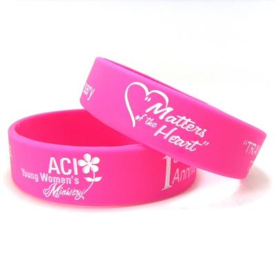 China Customized Debossed With Color Eco Friendly 0.75 Inch Width Logo Silicone Ink Filled Wristband for sale