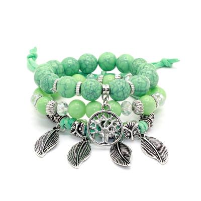 China Cute Women Bracelet Set 6 Colors Candy Beads Leaf Fox Owl And Tree Charm Bracelets And Bangles Strands Stretch Friendship Bracelets Pack For Women for sale