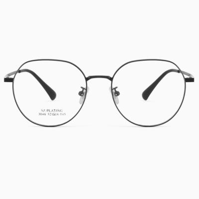 China Fashion Retro Factory Round Eye Stock Optical Frames Metal Eye Glass Ready Frames For Women Men for sale