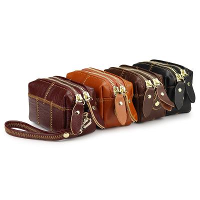 China Fashion Designer Whip Fashionable Ladies Wallet Wrist Bag Genuine Leather Main Purse Mini Small Women Coin Purses for sale