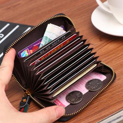 China New Classic Zipper Genuine Leather Wallet Card Holder Women Credit Card Small Purse Durable Leather Wallet Classic Durable Unisex Wallet for sale