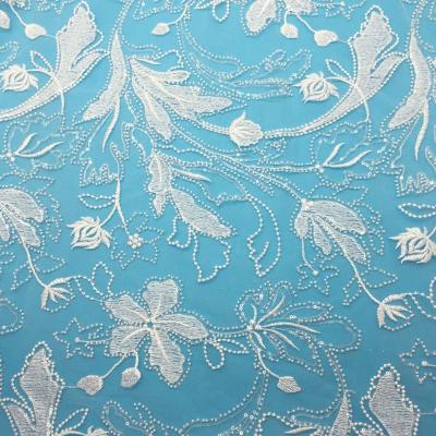 China New Style Flame Retardant Wedding Embroidered Pearl Fabrics Bridal Pearl Embroidery Mesh Tulle Lace Fabric for sale