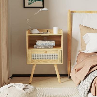 China Customized modern rattan nightstands furniture with drawer and charging station feet solid wood bedside table for bedroom for sale