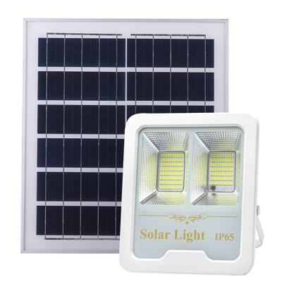 China High Brightness 100w Ip65 Outdoor Solar Powered Led Garden Wall Night Camping Lamps for sale