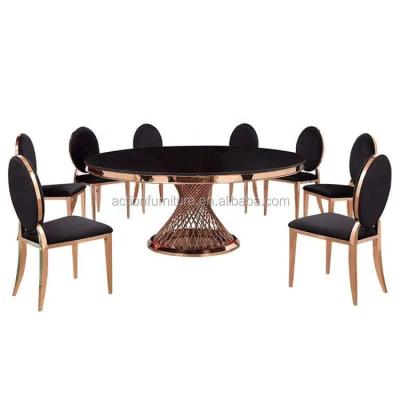 China Laser cutting large round dining room furniture stainless steel cheap modern luxury royal dining table and chairs set design for sale