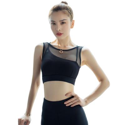 China Breathable Stitching Sportswear Women's Asymmetric High-Stretch Yoga Clothes Sleeveless Vest for sale