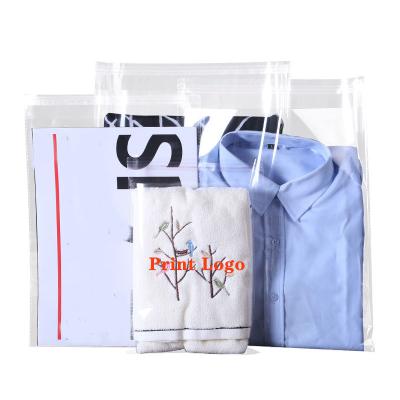 China Recyclable Custom Logo And Warning Print Clothes Clear Clothing Packaging Bag Eco Friendly PE Plastic Bags With Adhesive Tape for sale