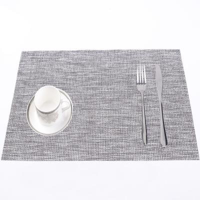 China Wholesales 45*30cm Rectangular Plastic PVC Dining Table Mat Insulation Plastic Woven Place Mats for sale