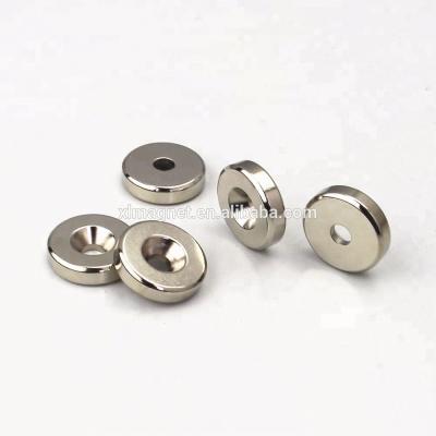 China Powerful Milled Magnetic Noedymium Industrial Magnet With Screw Hole for sale