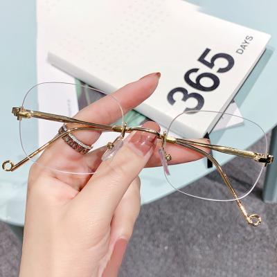 China For Reading Glasses 2022 Women Shape Rimless River Round Wholesale Glass Frames Optical Frame Eyeglasses for sale