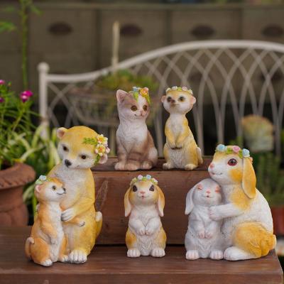 China Creative Outdoor Home Decor Europe Garden Cute Cartoon Rabbit Resin Statue for sale