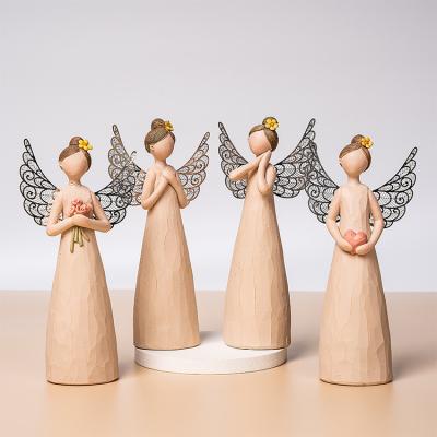 China Europe angel border bouquet to celebrate friendship resin sculpture crafts resin home decoration for sale