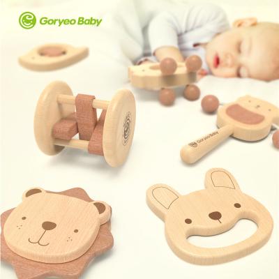 China Wooden Infant Baby Toy Gift Hand Rattle Hand Bell Early Game Cartoon Shape Hand Bell Education Fun for sale