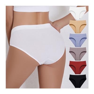 China Sexy Women's Breathable Underwear Lady Large Size Mid Waist Panties Solid Color Seamless Briefs for sale