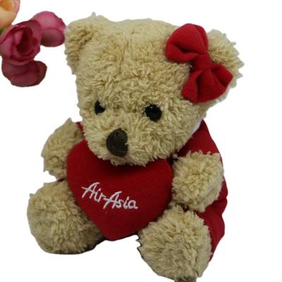 China Soft Plush Teddy Bear Plush Toy With Clothing And Heart For Valentine's Day for sale