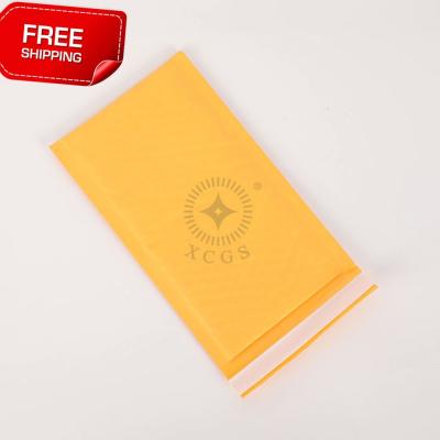 China Shock Resistance Matte Bubble Mailers Kraft Express Bulk Packaging Bag For Clothes Packing for sale