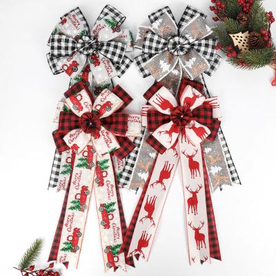 China Christmas Day New Product Sun Flower Polyester Plaid Ribbon Bow Christmas Decoration For Christmas Tree Arch for sale