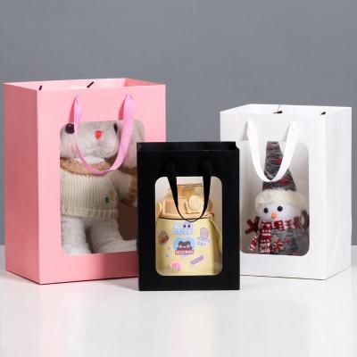 China Recyclable Gift Bag With Flowers Transparent Gift Bag Festival Display Window Souvenirs Packaging Bag for sale