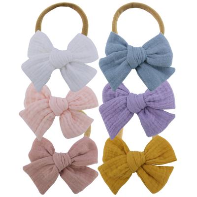 China Baby Friendly Material Nylon Headband For Newborn Girls Cute Bow Headbands For Kids Baby Hair Accessories for sale