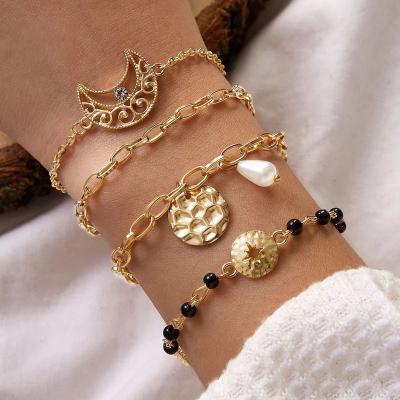 China Durable Beaded Bracelet Pearl Bracelet Cavity Moon Pendant Bracelet For Women for sale