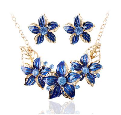 China CLASSIC shuiin enameled plumeria flower earring and necklace set gold plated hawaiian jewelry wholesale factory price for sale