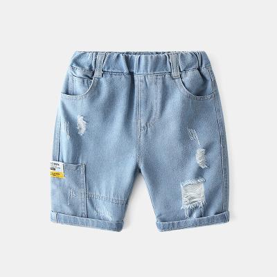 China Viable Children's New Pants Boys Pants Casual Ripped Jeans Capris Denim Pants for sale