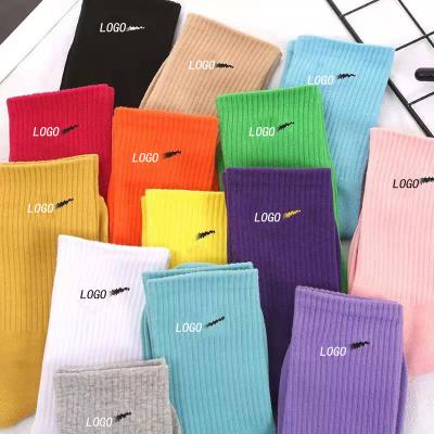 China 2021 breathable new wholesale cheap thongs thin candy color cotton tube women branded graffiti sport luxury socks for sale