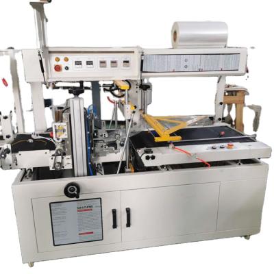 China APPAREL Shrink Packaging Machine Automatic Heating Film Shrink Packer Film Shrink Packing Machine for sale